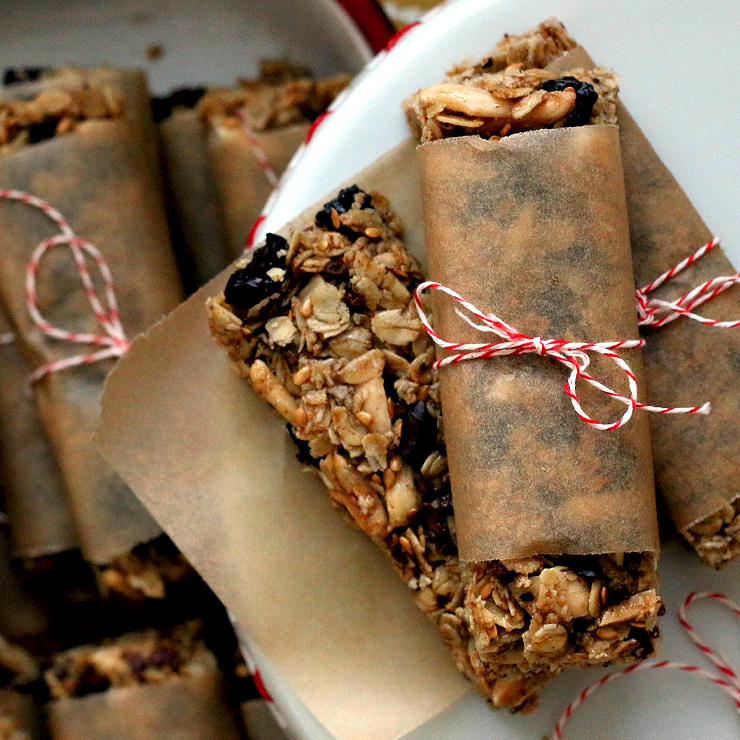 Brown paper packages tied up with string, these Vegan Gluten Free Almond Cherry Cacao Nib Granola bars are a few of my favorite things. AlmondCherryCacaoGranolaBarsSq