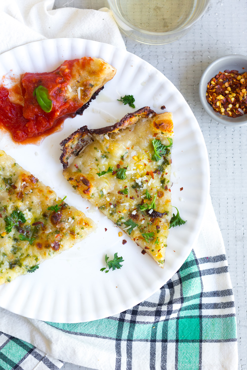 Cheesy Garlic Bread Pizza slice with red sauce.