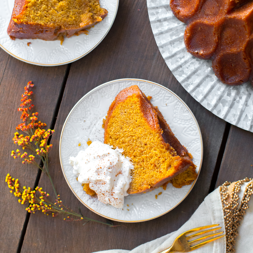 Pumpkin Spice Brown Butter Bourbon Bundt Cake with Cinnamon Whipped Cream.