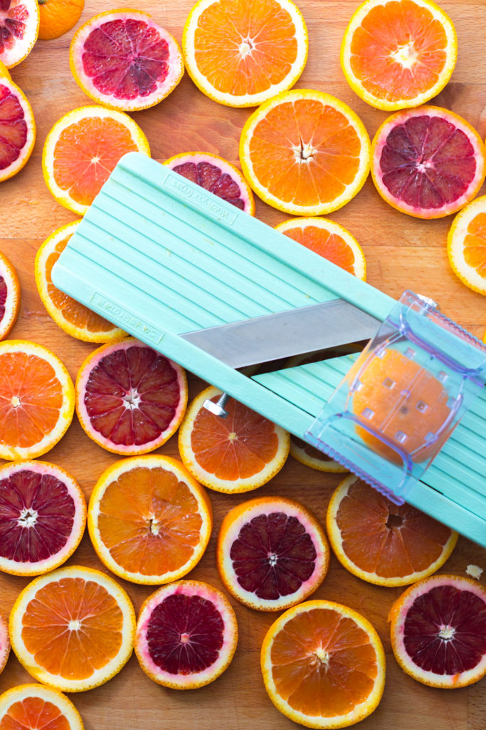 Using a mandolin to slice oranges