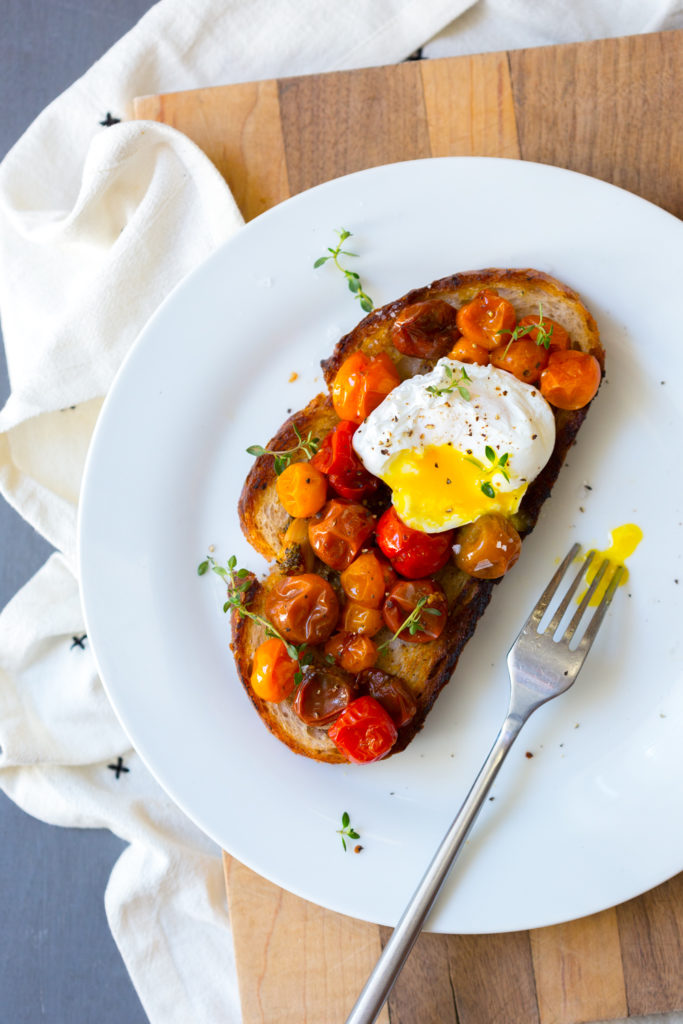 Cherry Tomato Confit with poached egg on toast