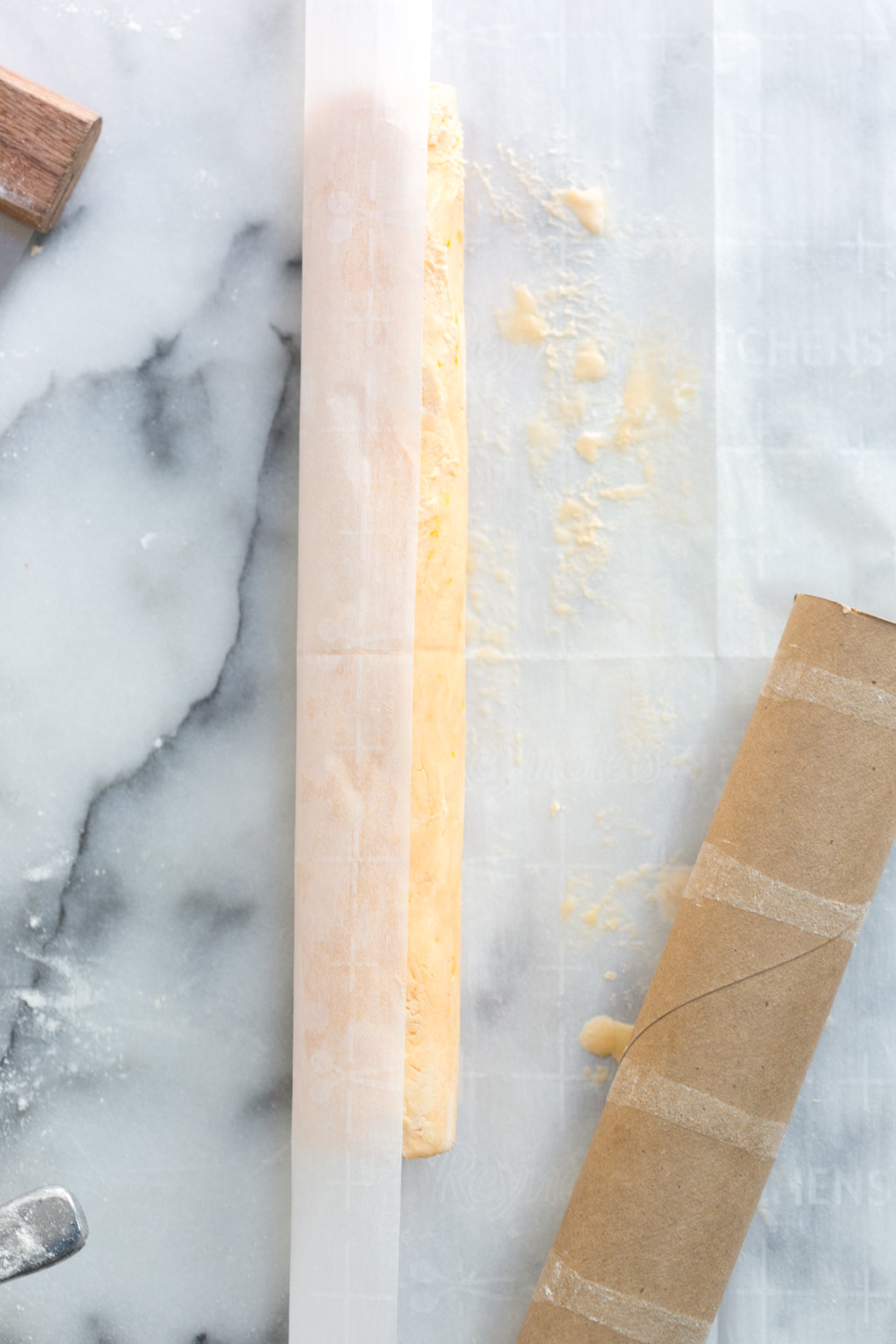 Rolling Campari Shortbread Cookie dough into a log