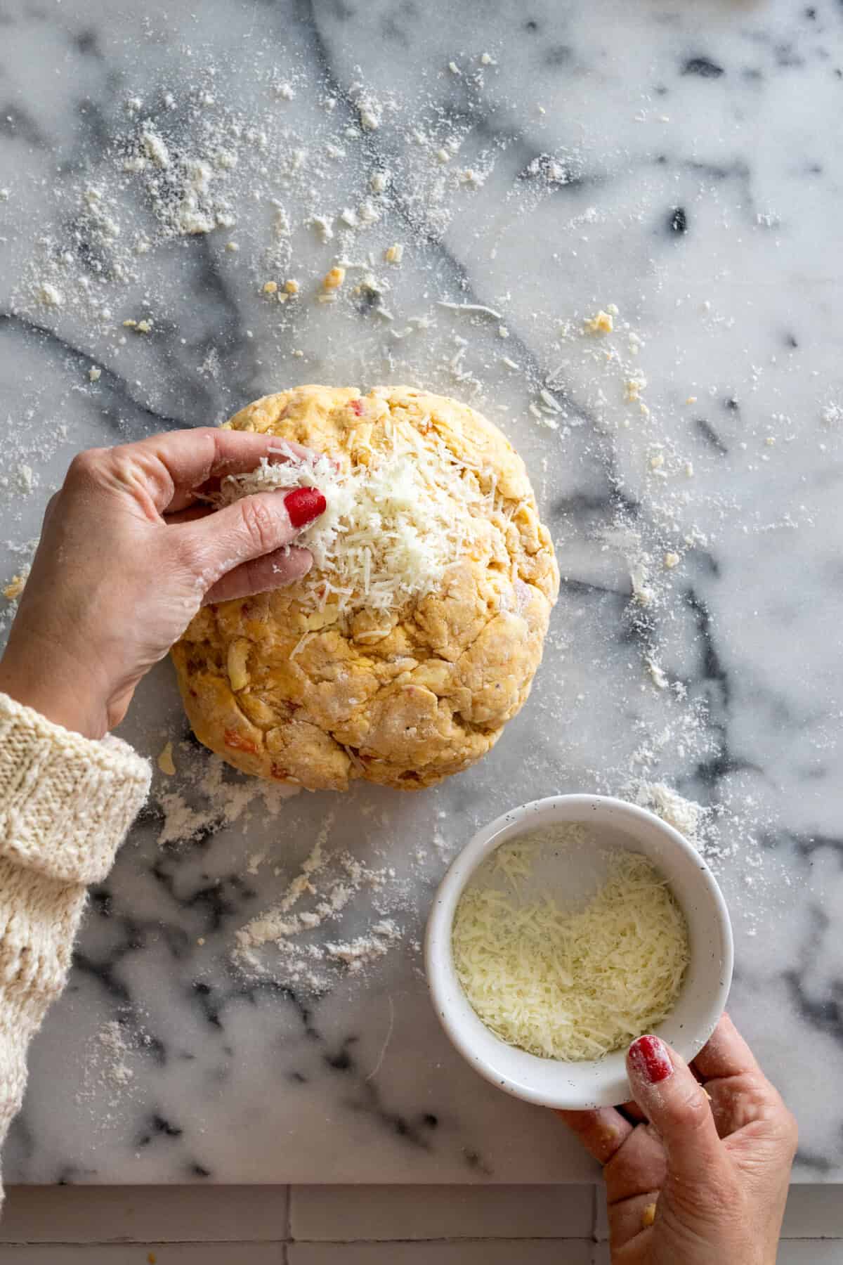 Top scones with Pecorino cheese